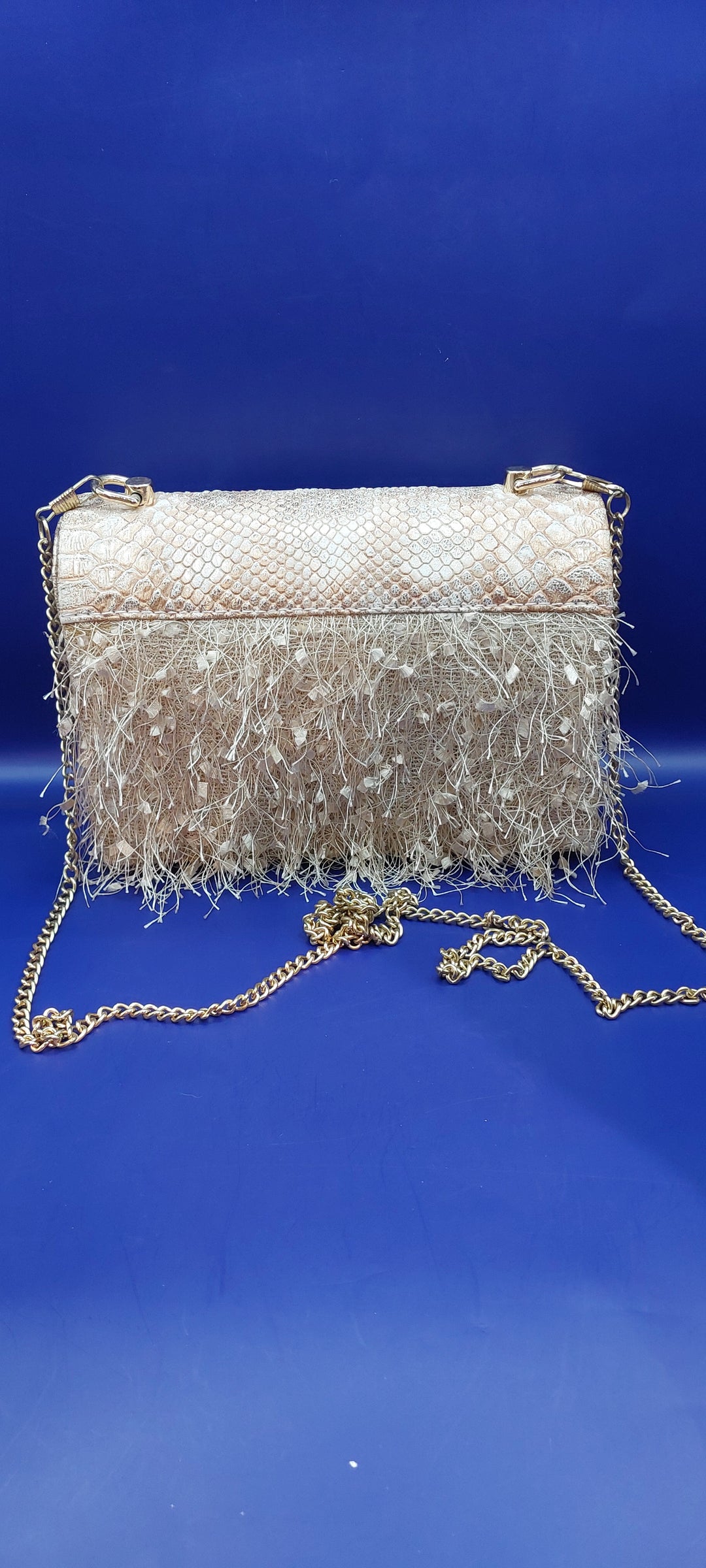 Uma Light Rose coloured Faux Snakeskin Leather with Feathers Purse | House of Inaayat