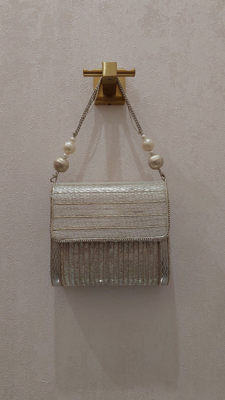 Silver Metallic Handcrafted Sling Bag | Al Falah