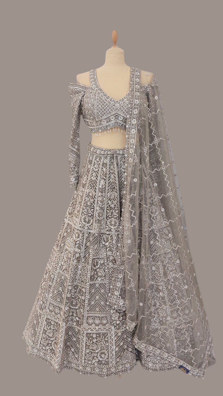 Shagun Metallic Silver Lehenga with a Cut-Out Sleeve Blouse Set | Inaayat by Divya Taimni