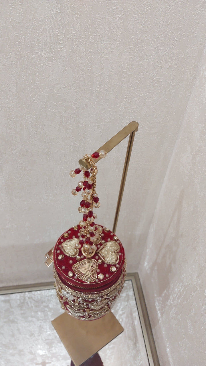 Maroon Heart Embellished Bucket Clutch| Al Falah