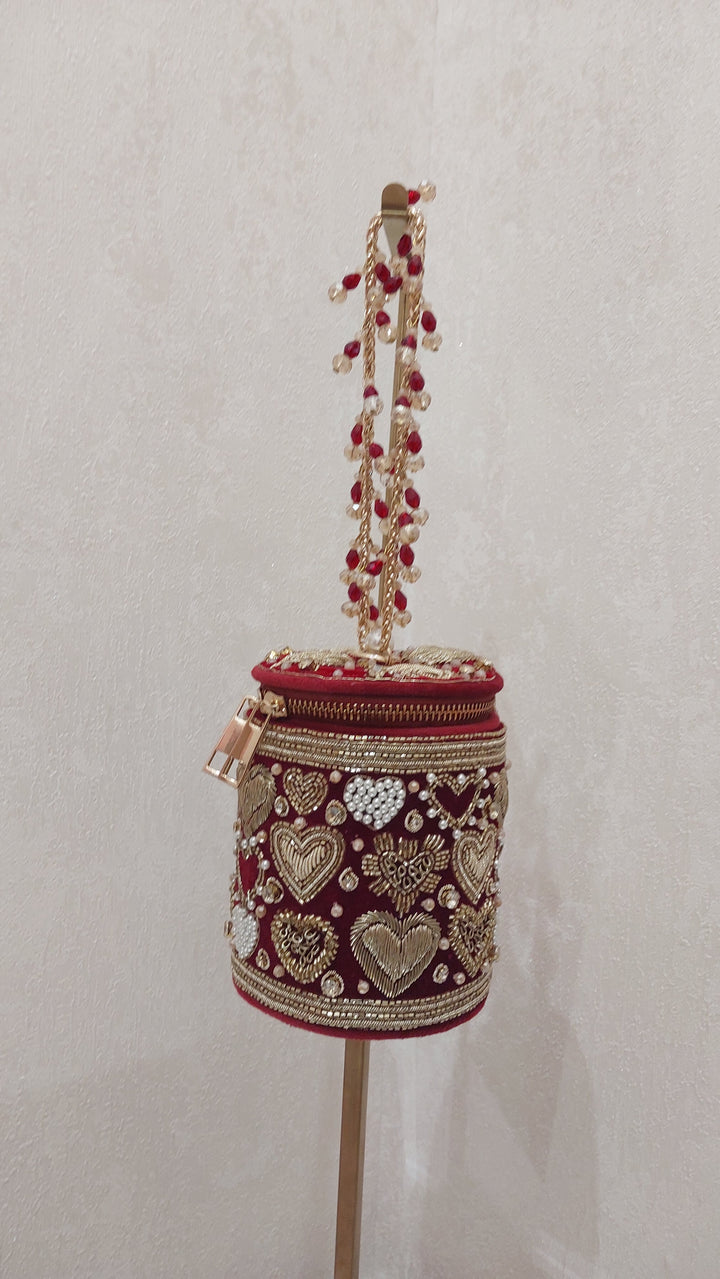 Maroon Heart Embellished Bucket Clutch| Al Falah