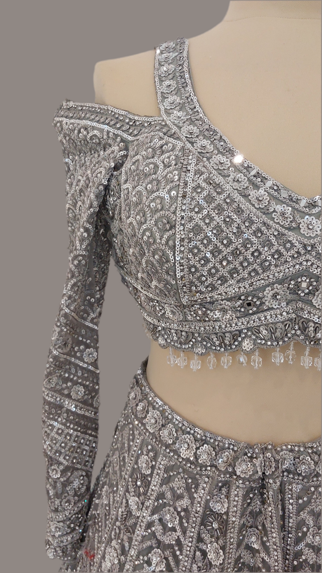 Shagun Metallic Silver Lehenga with a Cut-Out Sleeve Blouse Set | Inaayat by Divya Taimni