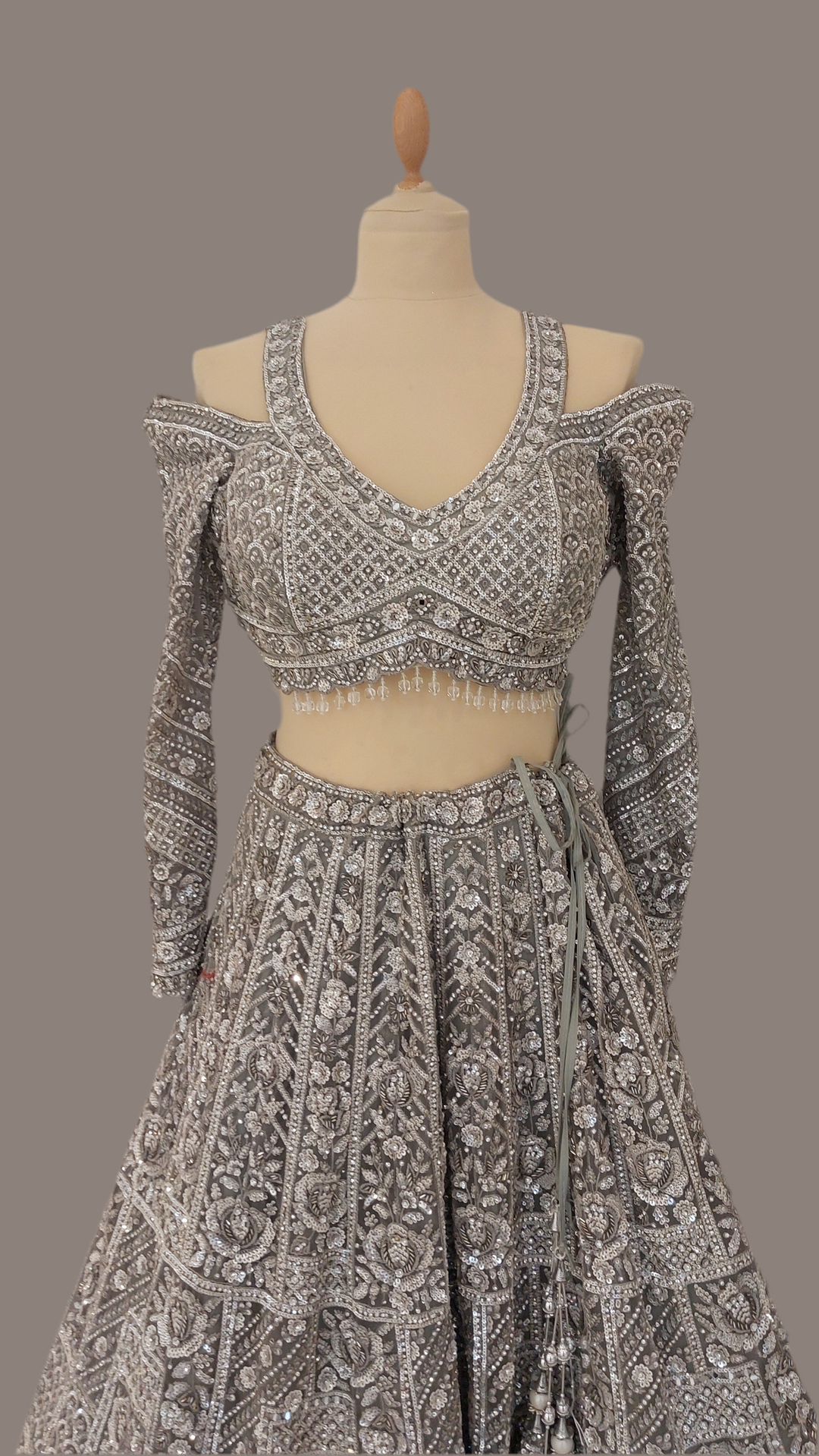 Shagun Metallic Silver Lehenga with a Cut-Out Sleeve Blouse Set | Inaayat by Divya Taimni
