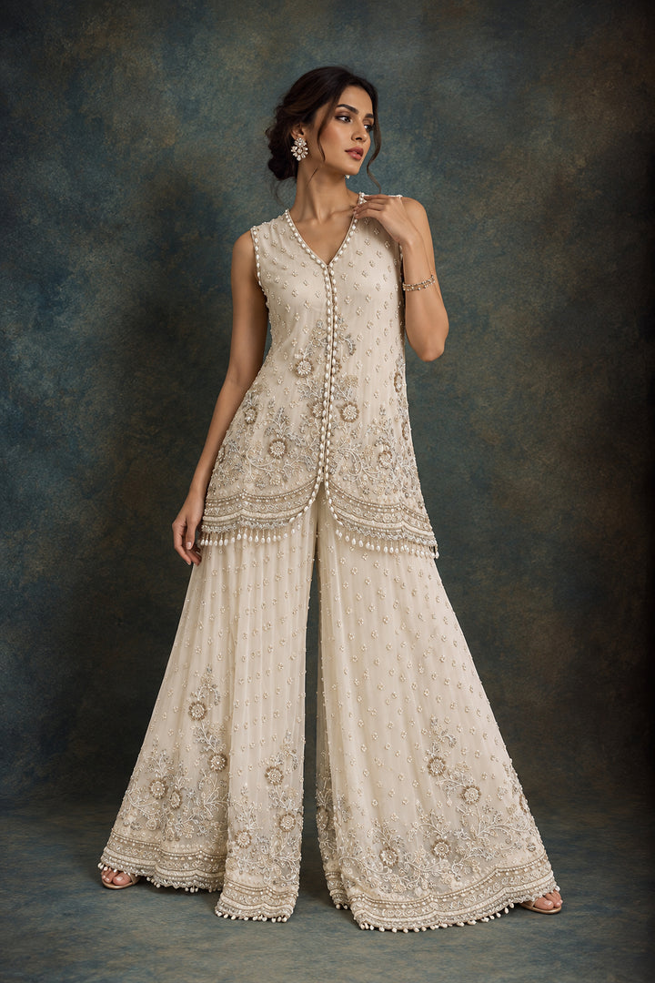 Ivory Embellished Peplum Top with Pants Set | AURAROZE