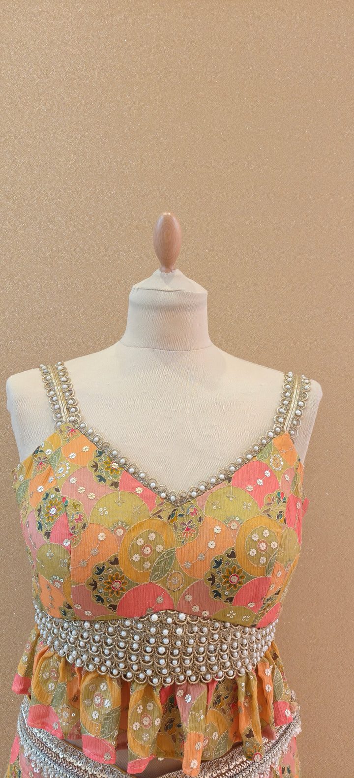 Yellow Printed Peplum Top With a Wrap Skirt and Petticoat| Private Collections