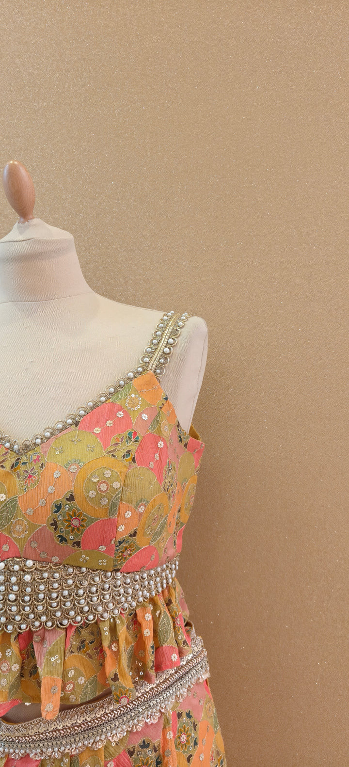 Yellow Printed Peplum Top With a Wrap Skirt and Petticoat| Private Collections