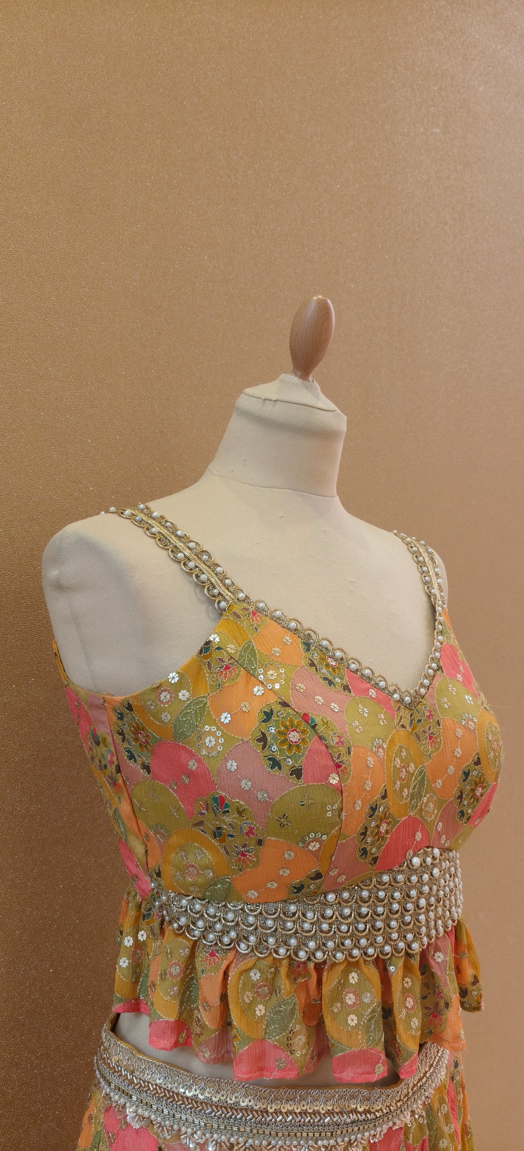 Yellow Printed Peplum Top With a Wrap Skirt and Petticoat| Private Collections