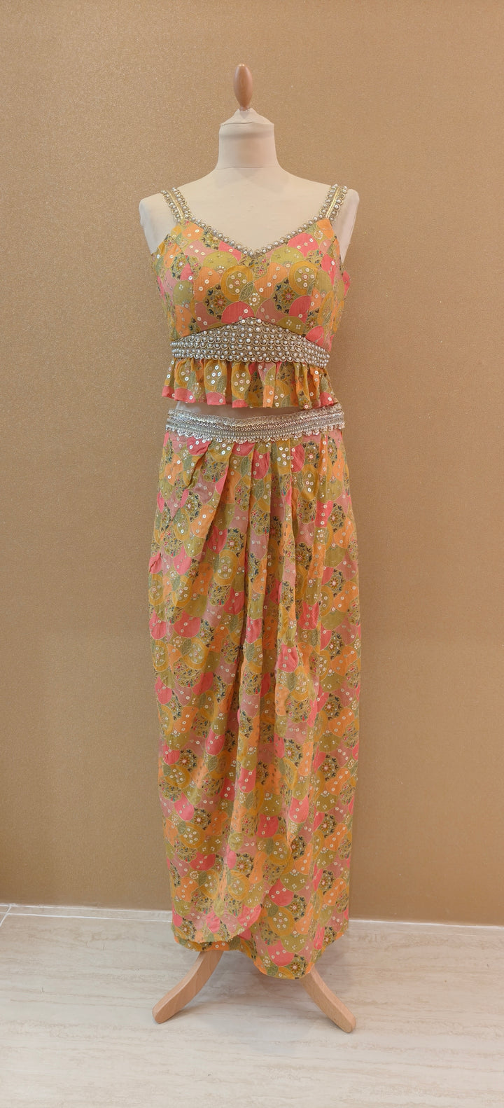 Yellow Printed Peplum Top With a Wrap Skirt and Petticoat| Private Collections