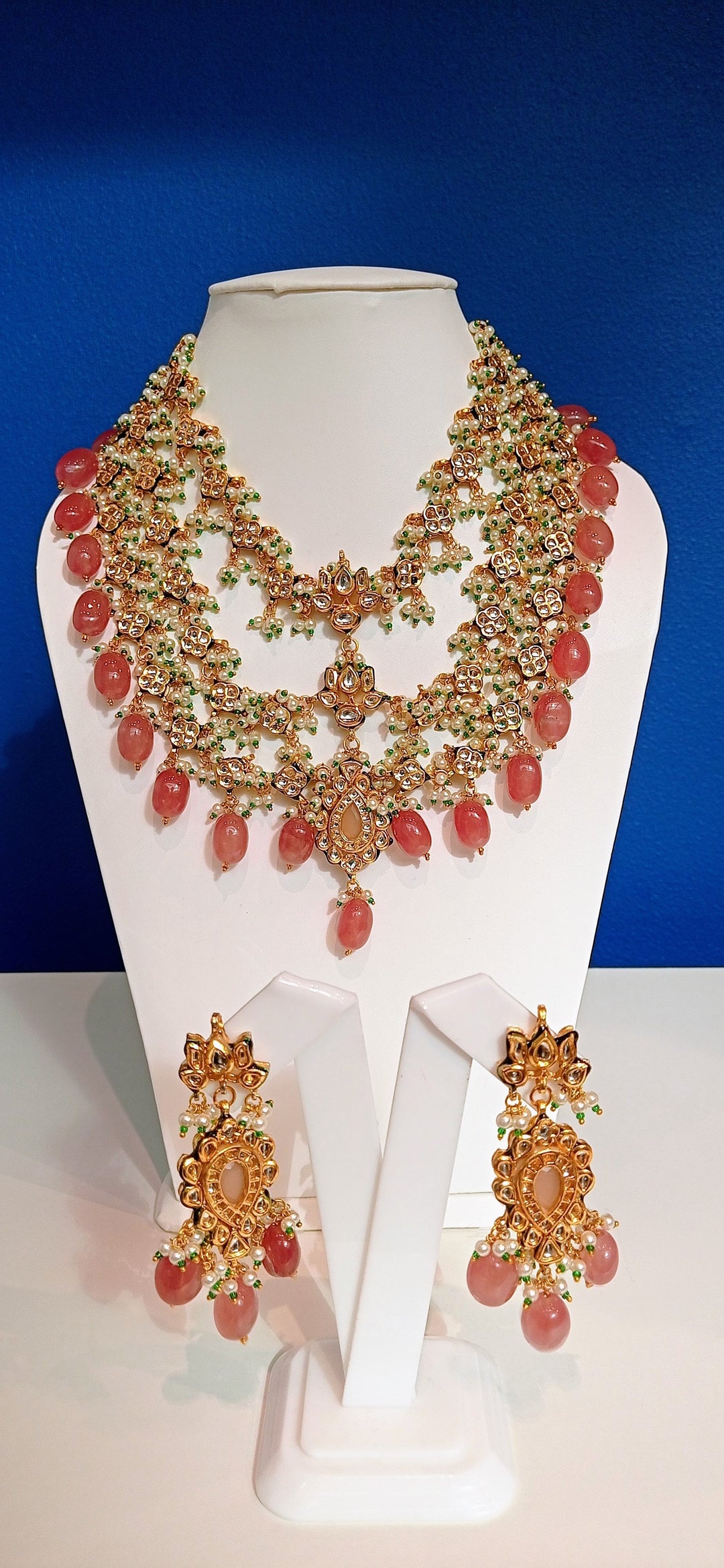 Hera Rose Pink and Gold Three-Tiered Kundan Necklace and Earrings Set|Inaayat by Divya Taimni