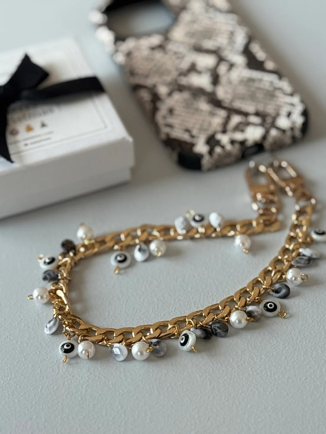 Black and Gold Evil Eye Bauble Wristlet | Natalzee