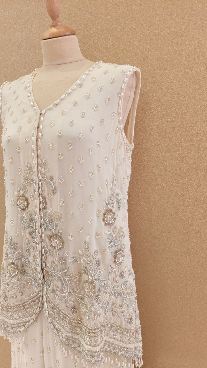 Ivory Embellished Peplum Top with Pants Set | AURAROZE